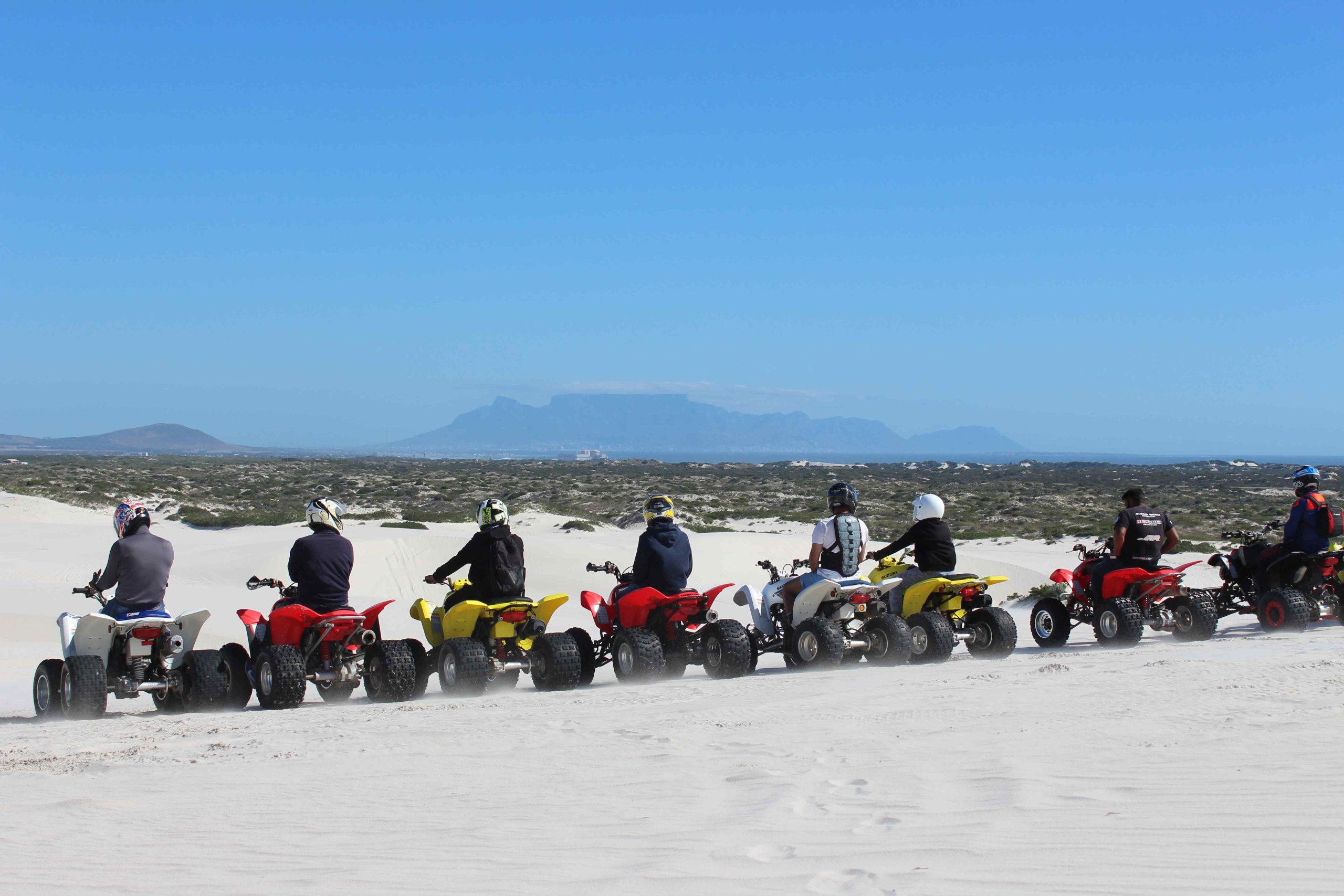 Guided quad biking on the white sand dunes at Atlantis Dunes, Cape Town