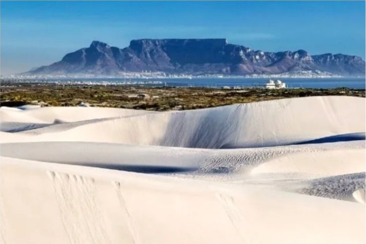 The white sands of Atlantis, with Table Mountain across the bay.